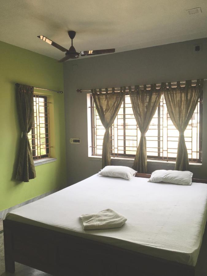 Whispering Woods Inn Bolpur Extérieur photo